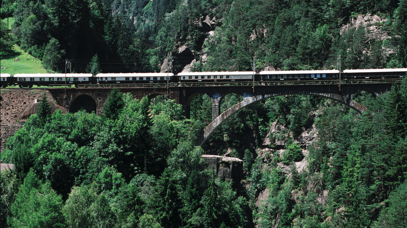 The return of European sleeper trains | The Venice Simplon Orient Express travelling over a viaduct