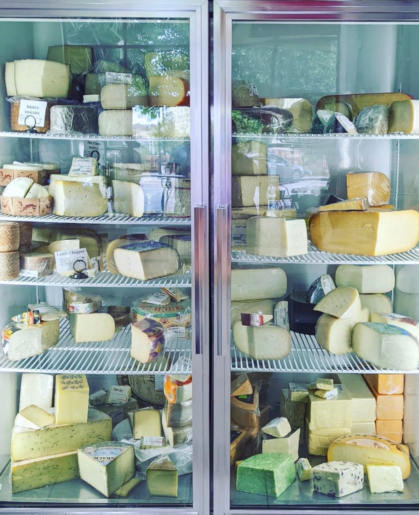 Guide to Paso Robles | Different types of cheese of different colours in a fridge