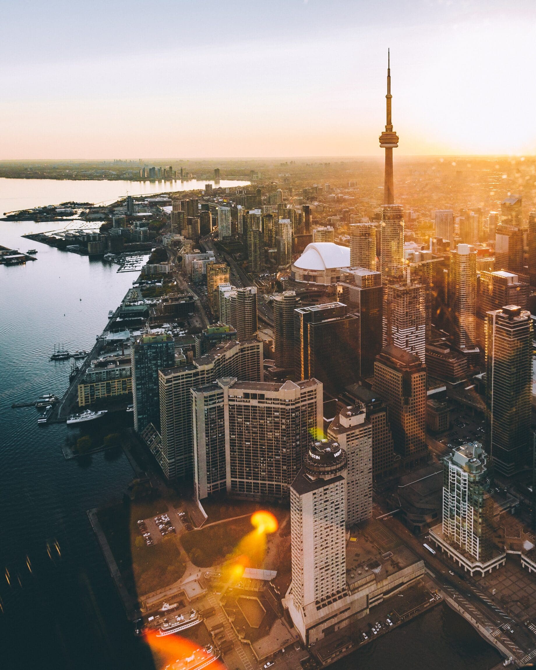 The future of queer travel | Sunset helicopter tour over downtown Toronto