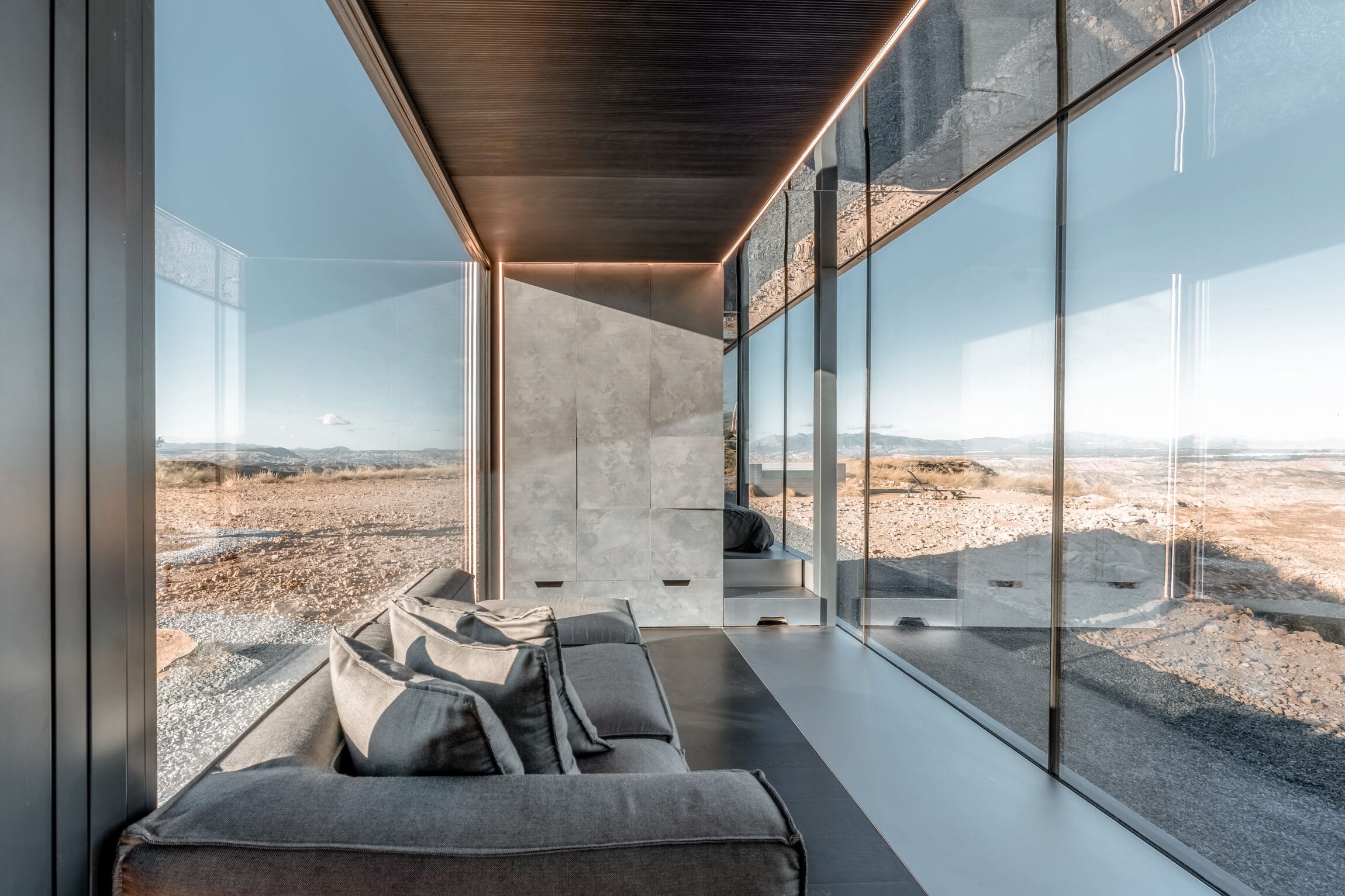 AI and the travel industry | glass-fronted hotel-pods by District Hive in Spain