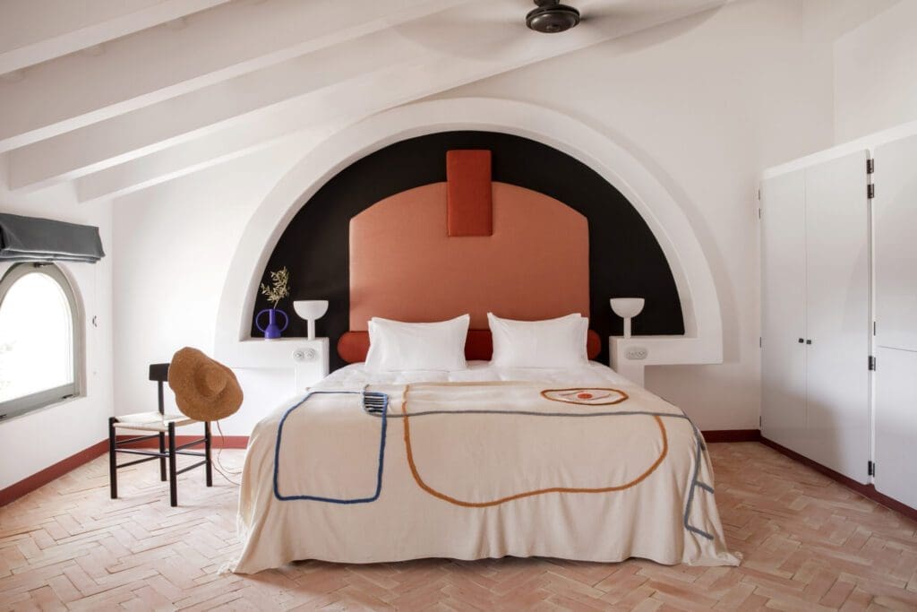 The most beautiful art and design destinations in Europe | A colourful bedroom at Experimental Menorca hotel