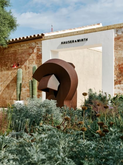 Hauser & Wirth Menorca, on the Isla del Rey in Mahon harbour, with garden design by Piet Oudolf, and a steel sculpture by Eduardo Chillida