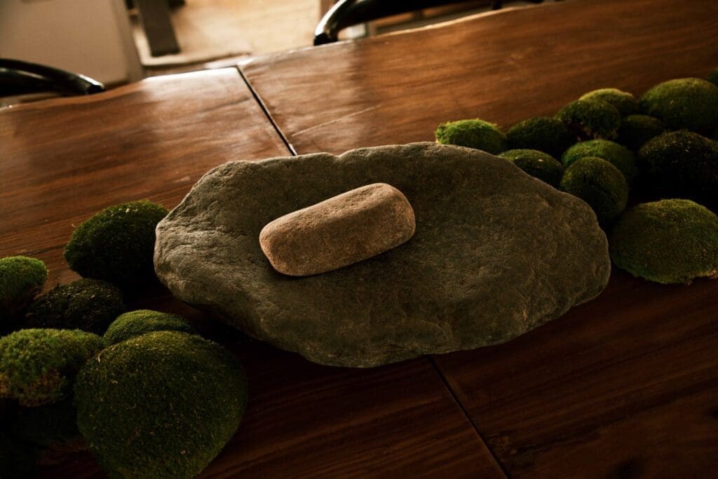 Chef Michael Adé Elégbèdé | A traditional stone used to grind pepper and other herbs in Nigerian cuisine, on display at Ìtàn Test Kitchen.
