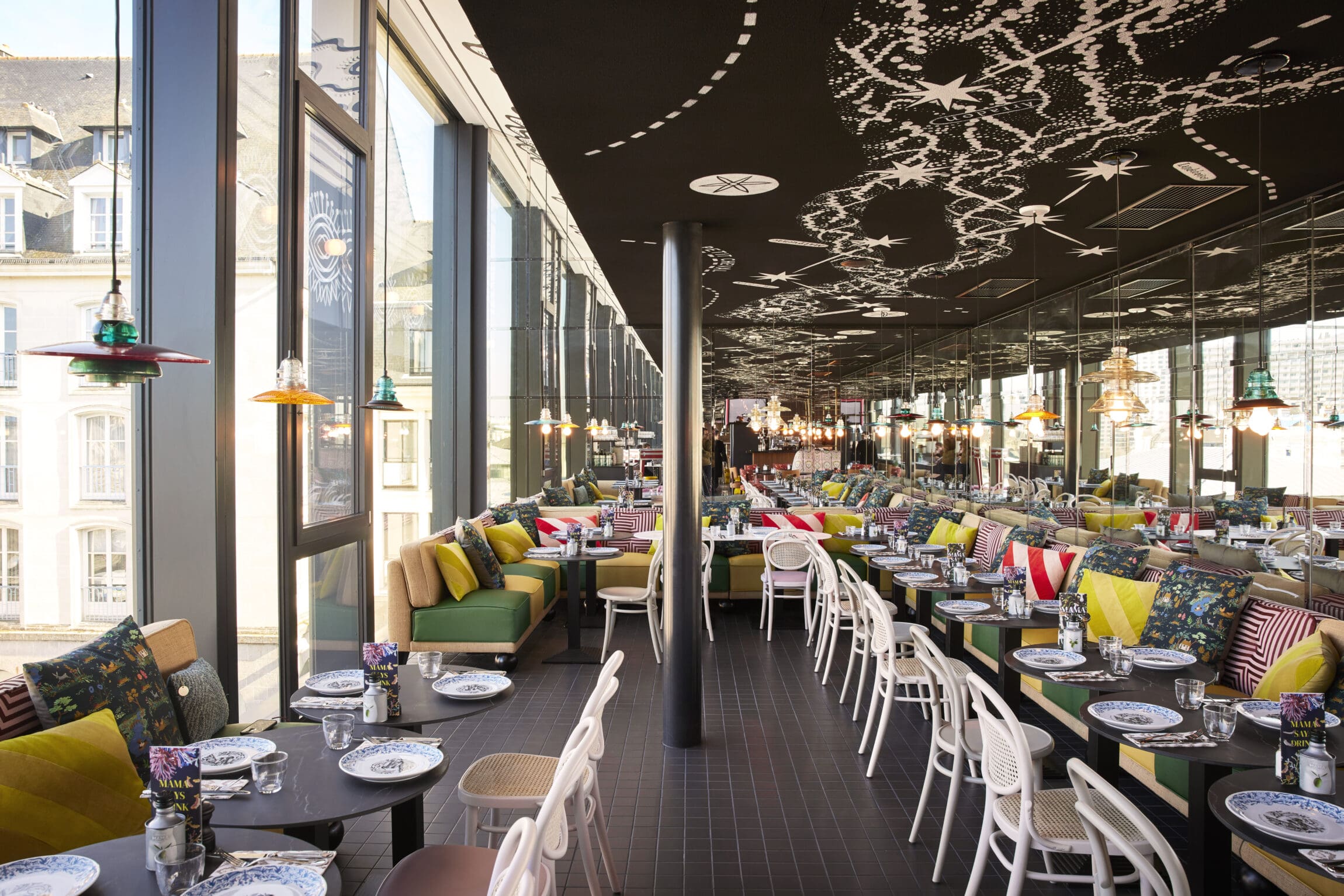 The best new hotels for Spring 2023 | the exuberantly designed restaurant at Mama Shelter Rennes