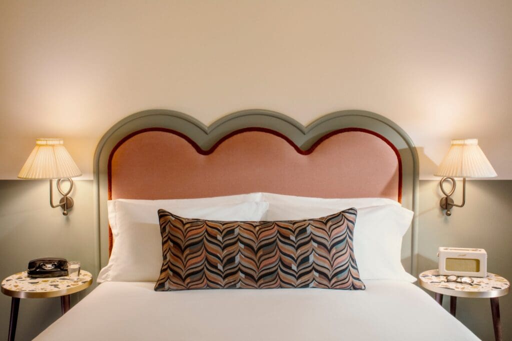New hotels for Spring 2023 | A peach-toned statement headboard at The Hoxton