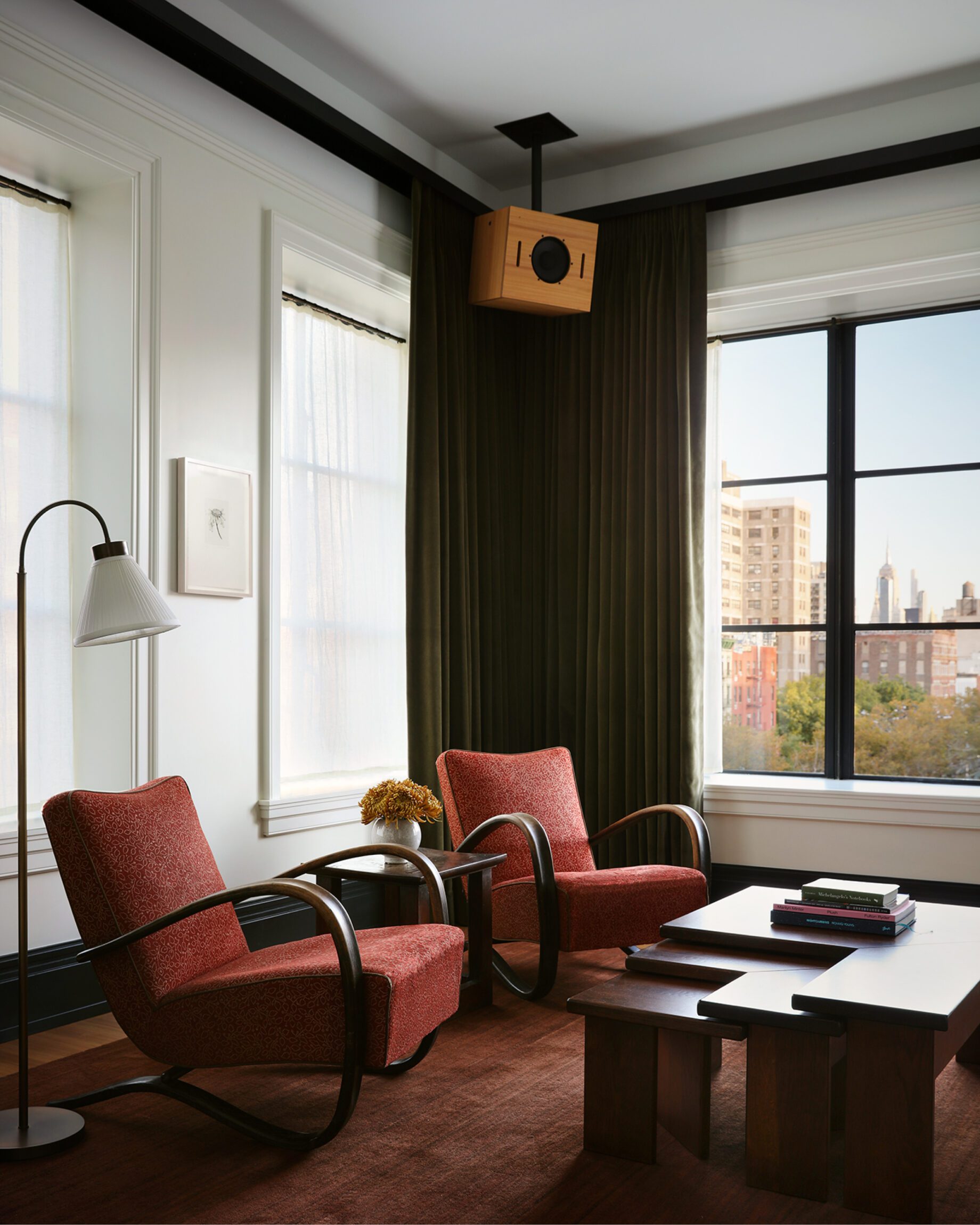 The best hotels in New York | cranberry-toned chairs at the Nine Orchard hotel