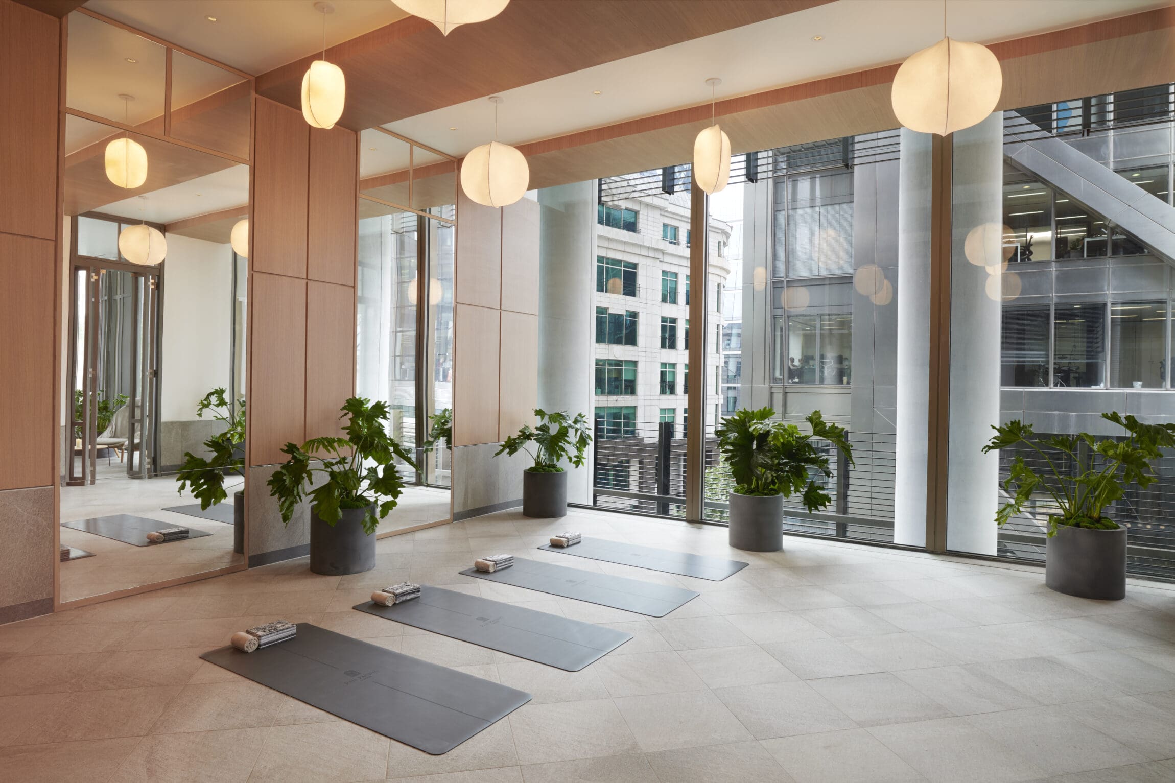 Sleep tourism and hotels | yoga mats in a light-filled studio at Pan Pacific London