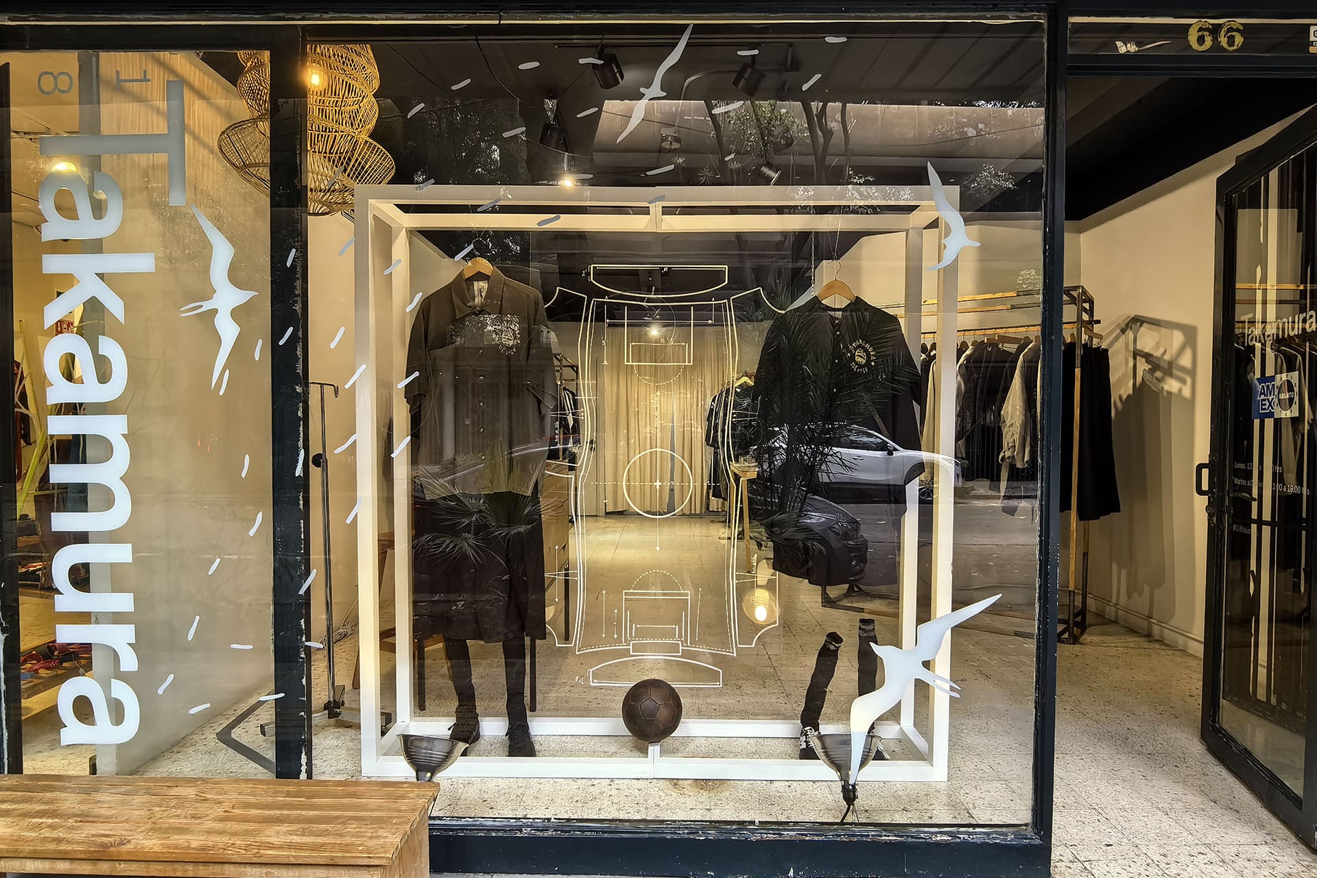 The exterior of 1/8 Takamura in Mexico City, with monochrome clothes on display