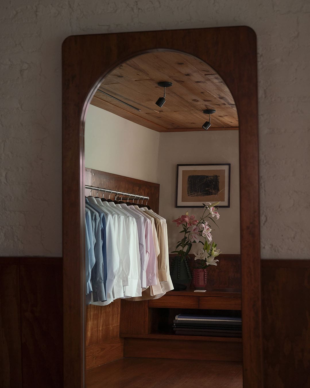 Chava Studio shirts in a mirror reflection