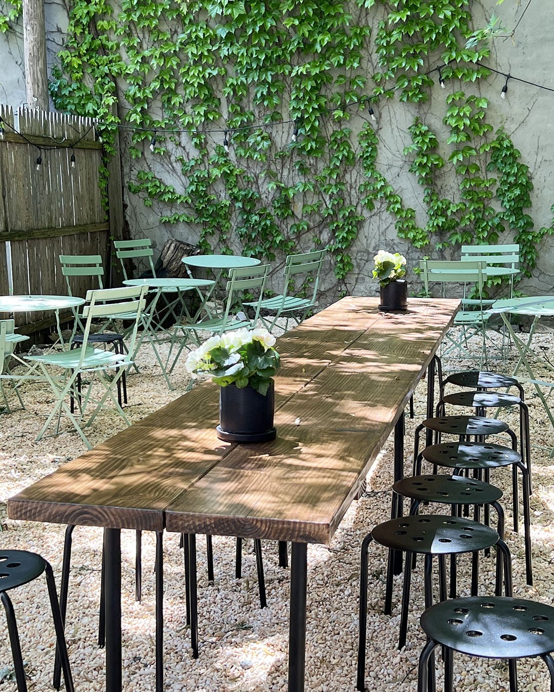 Frog's sun dappled wine garden, in New York City. NYC