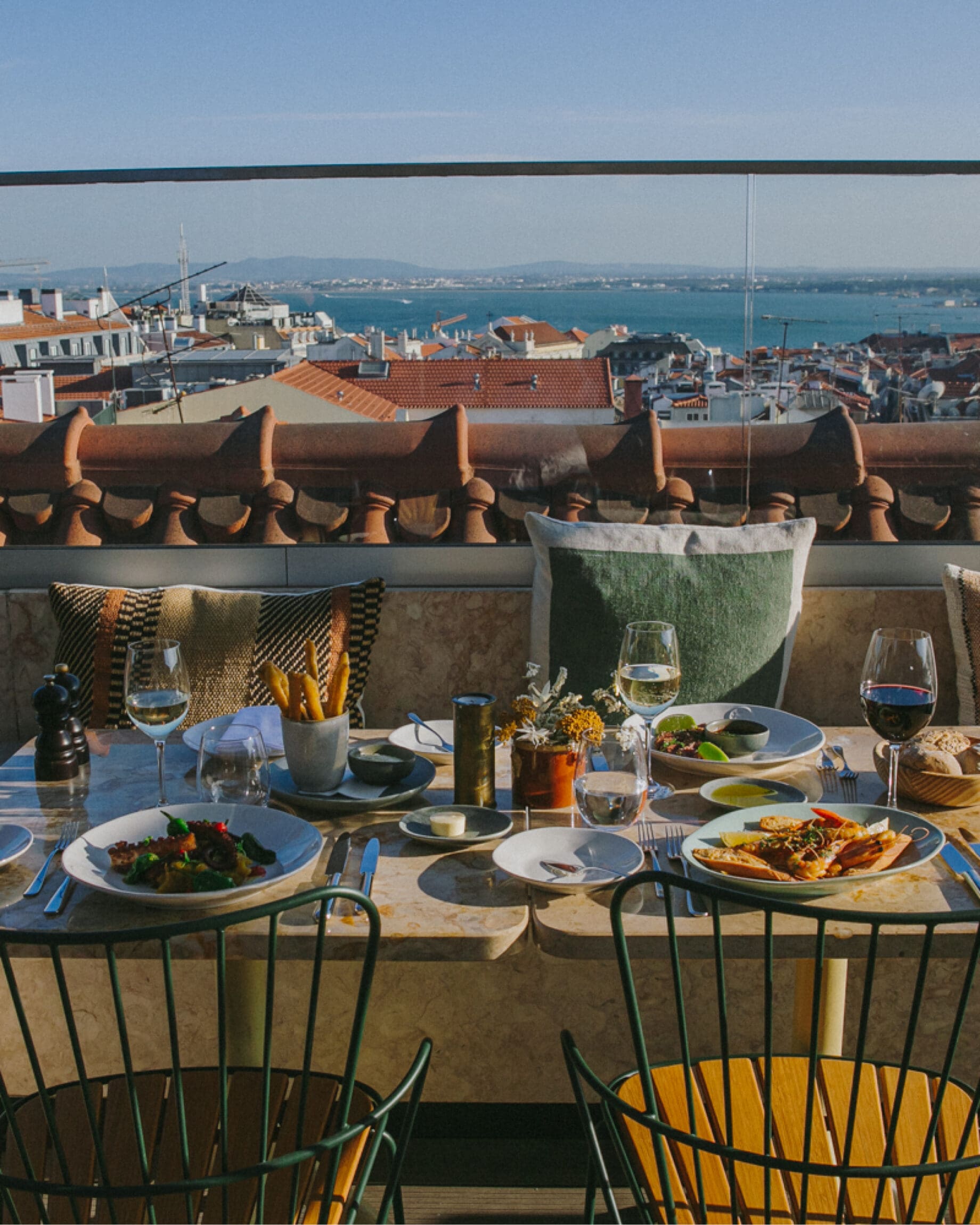 Rooftop restaurant with an impressive table setting at The Lumiares in Lisbon