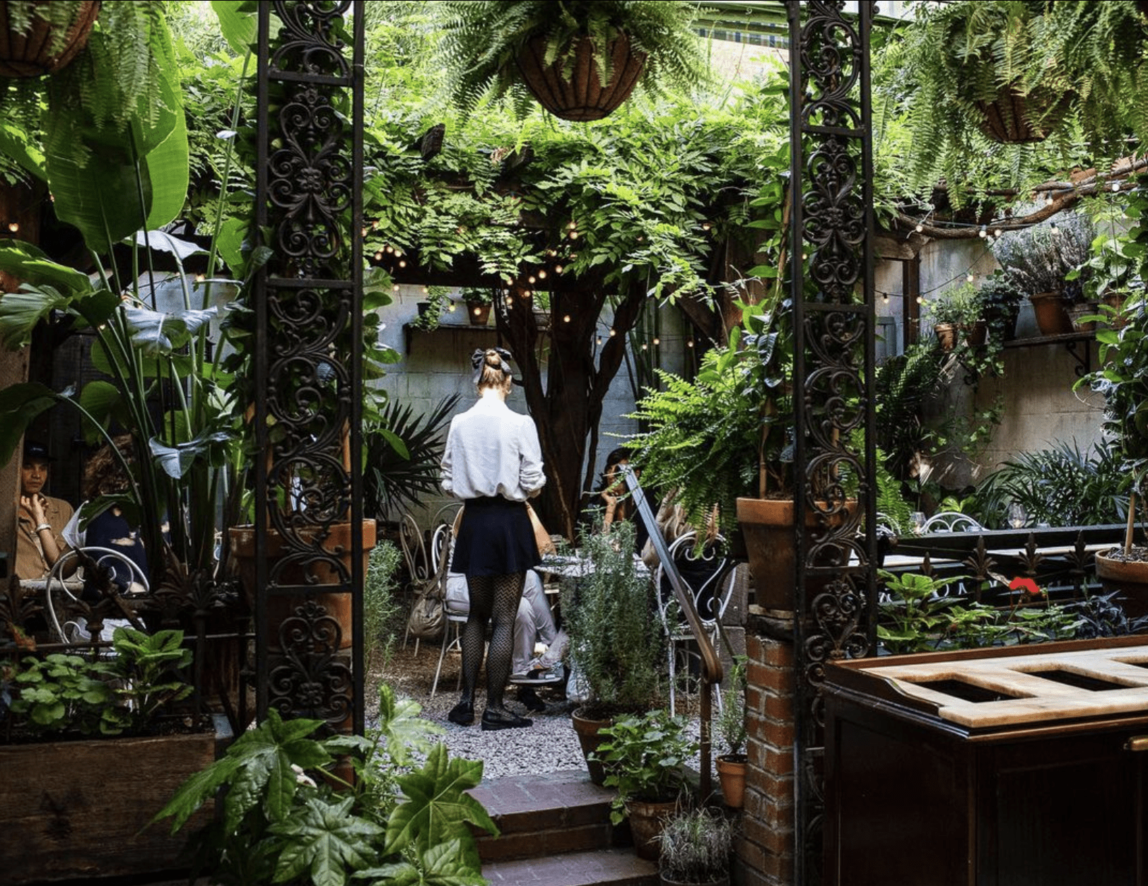 The best outdoor bars and restaurants in New York City | The lush garden at Maison Premiere