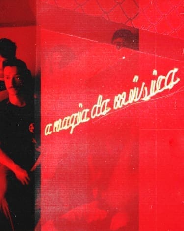 Where to experience live music in Lisbon | a neon sign against a red graphic background