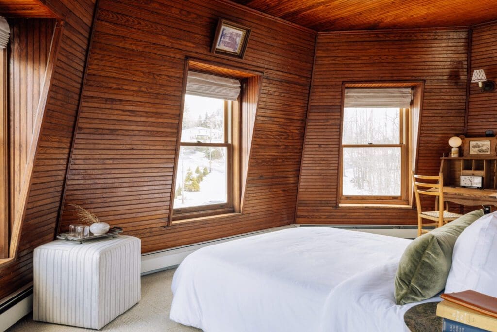 The best boutique hotels in the Catskills | a wood-clad room at Hotel Lilien