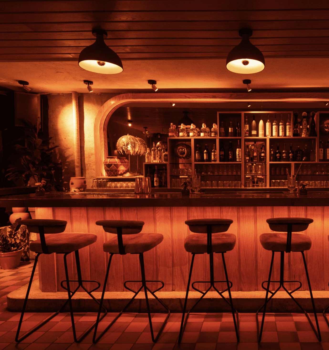 Bar Nena in the West Village, bathed in an orange glow