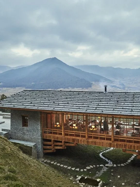 A lodge at Six Senses Bhutan with mountain views