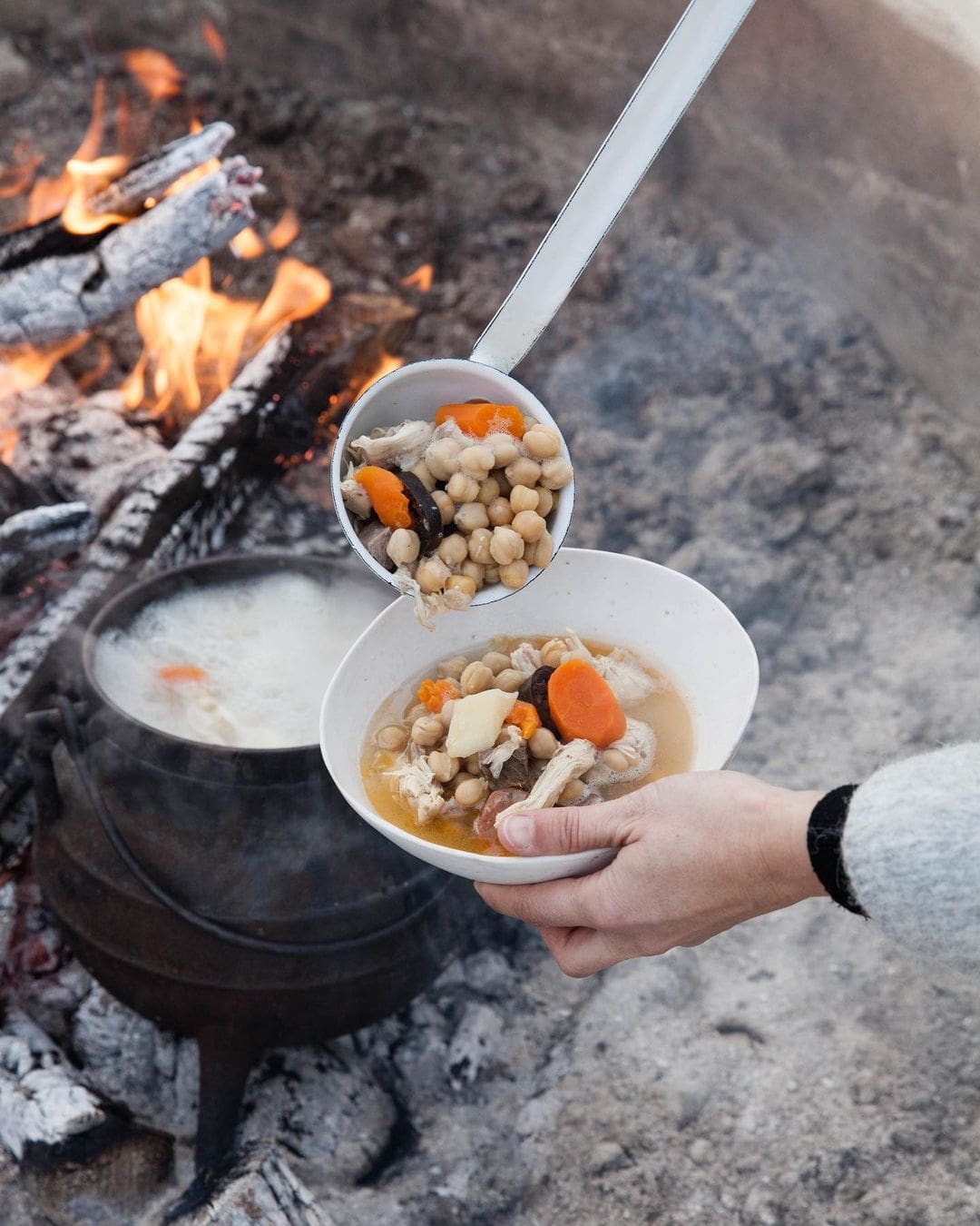 The best farm stays in Europe | a dish of vegetables cooked on an open fire