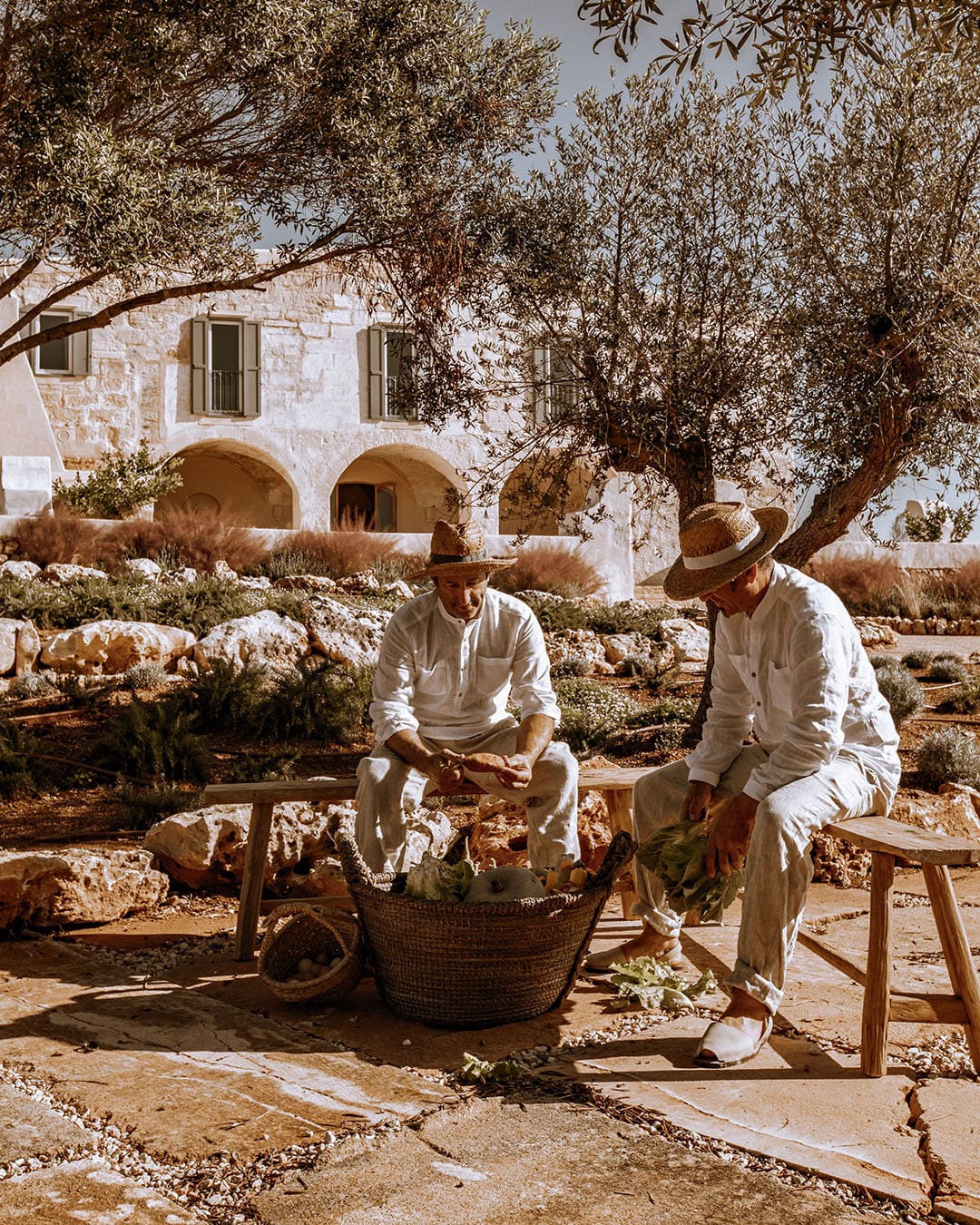 Two farmworkers at Son Blanc Farmhouse