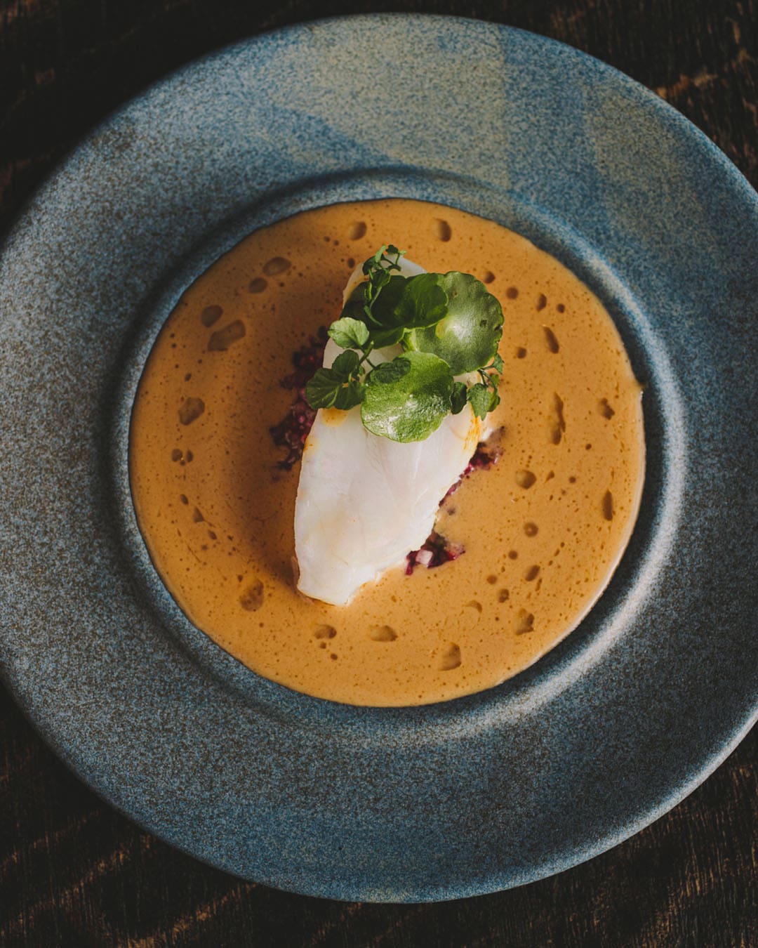 Monkfish in a grey slate bowl