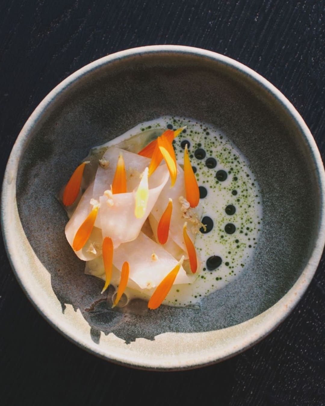 The best farm-to-table restaurants in the UK | Left: Kohlrabi, pickled elderflower and smoked whey butter seasoned with⁠ a garum made with mackerel trim at Grace & Savour.