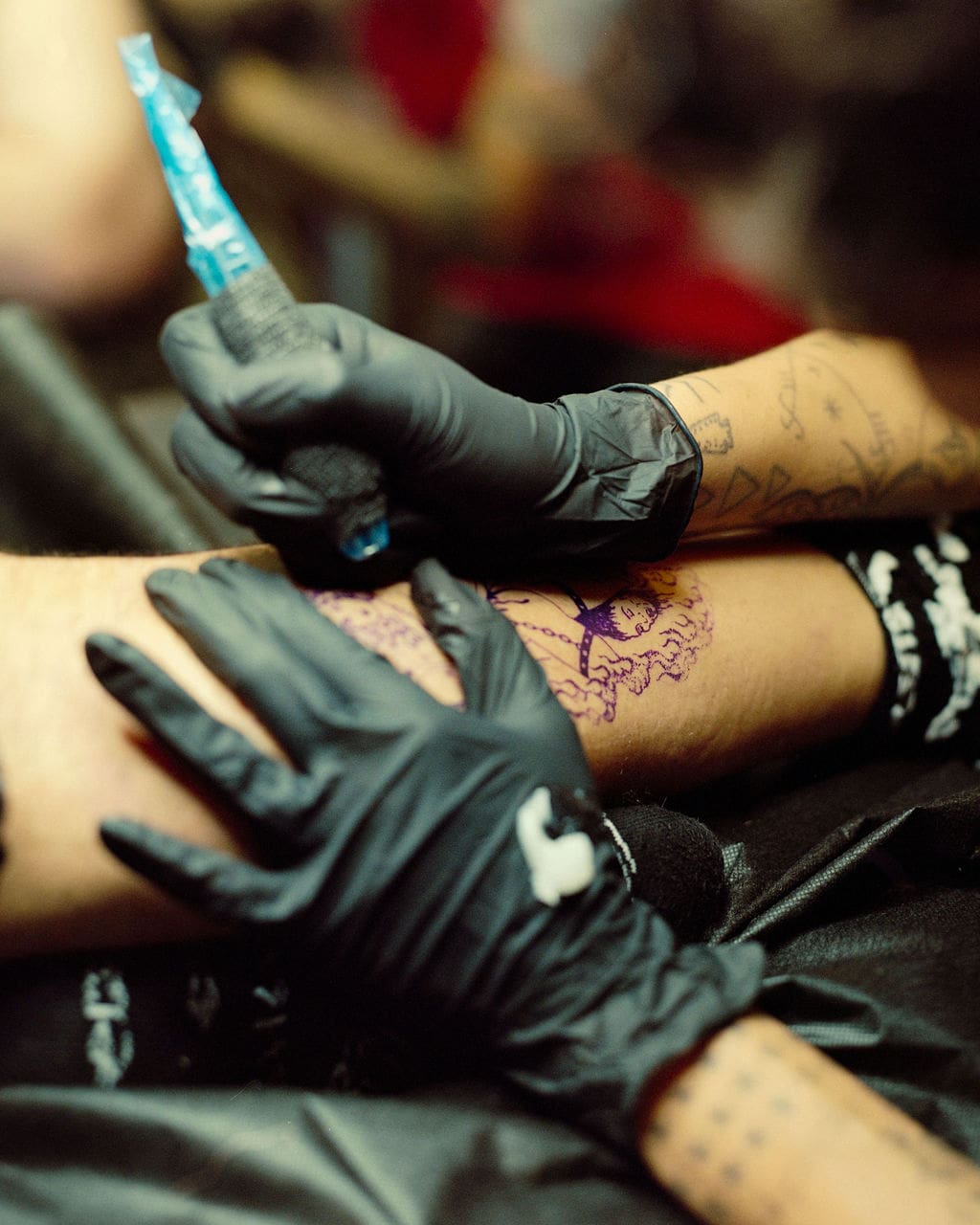 An interview with Tati Compton | A close-up of Tati tattooing in her LA studio
