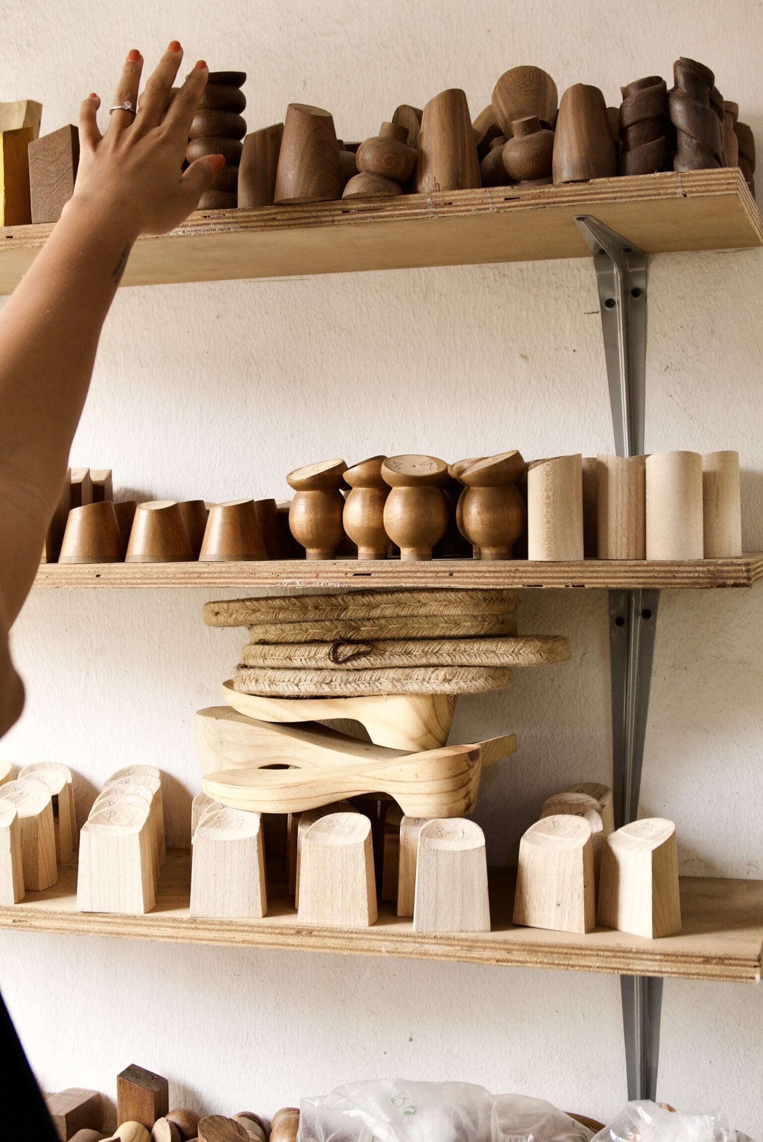 Ceramics on a shelf by Akudo Iheakanwa