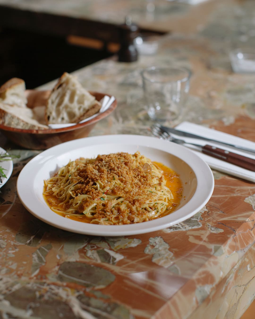 Shoreditch and Spitalfields | a pasta dish on a stone table at Padella