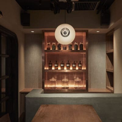 Wooden counter and bottles displayed in The Bellwood