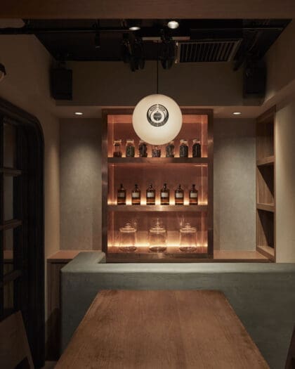 Wooden counter and bottles displayed in The Bellwood