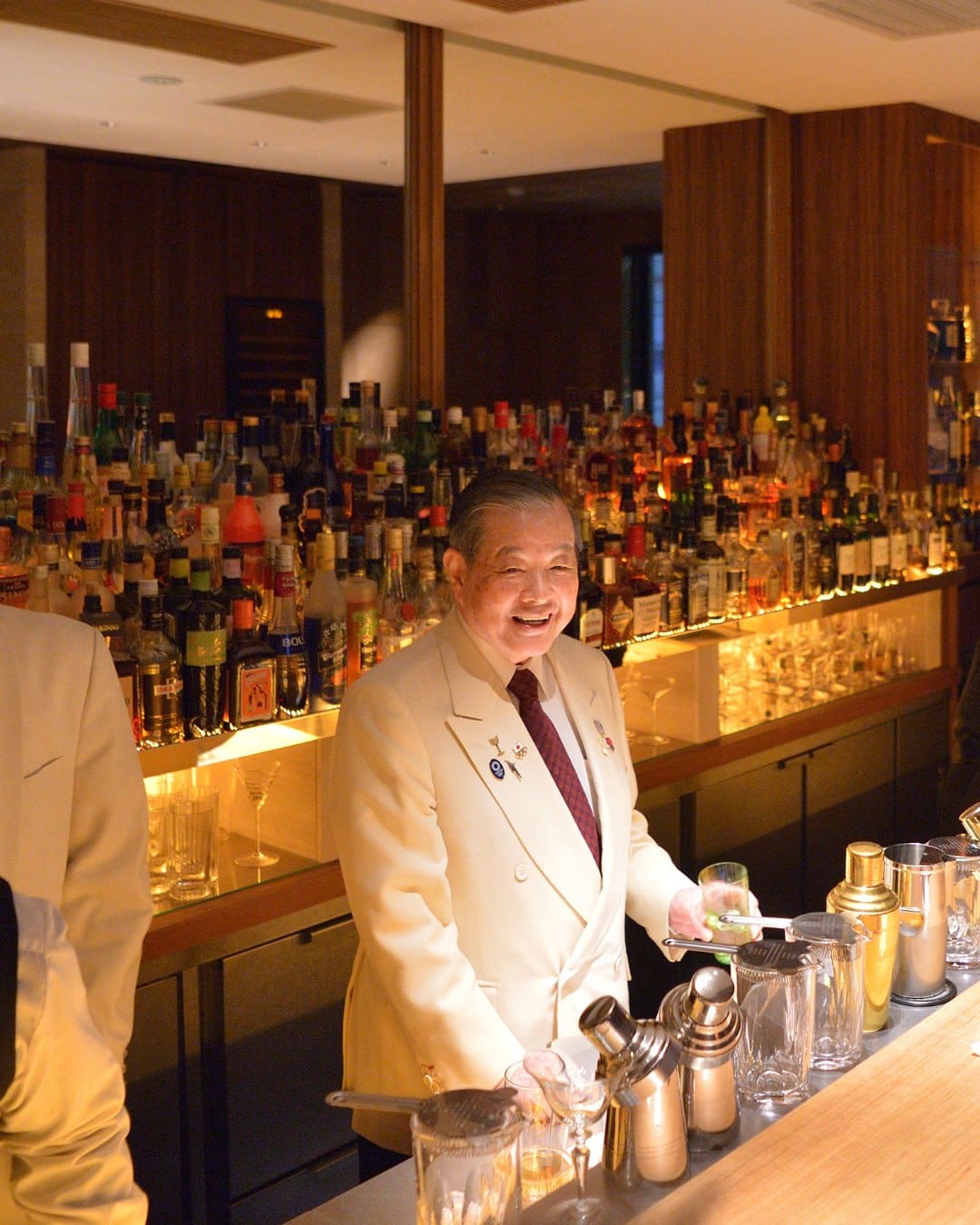 A bartender in a white tuxedo at Mori in Tokyo