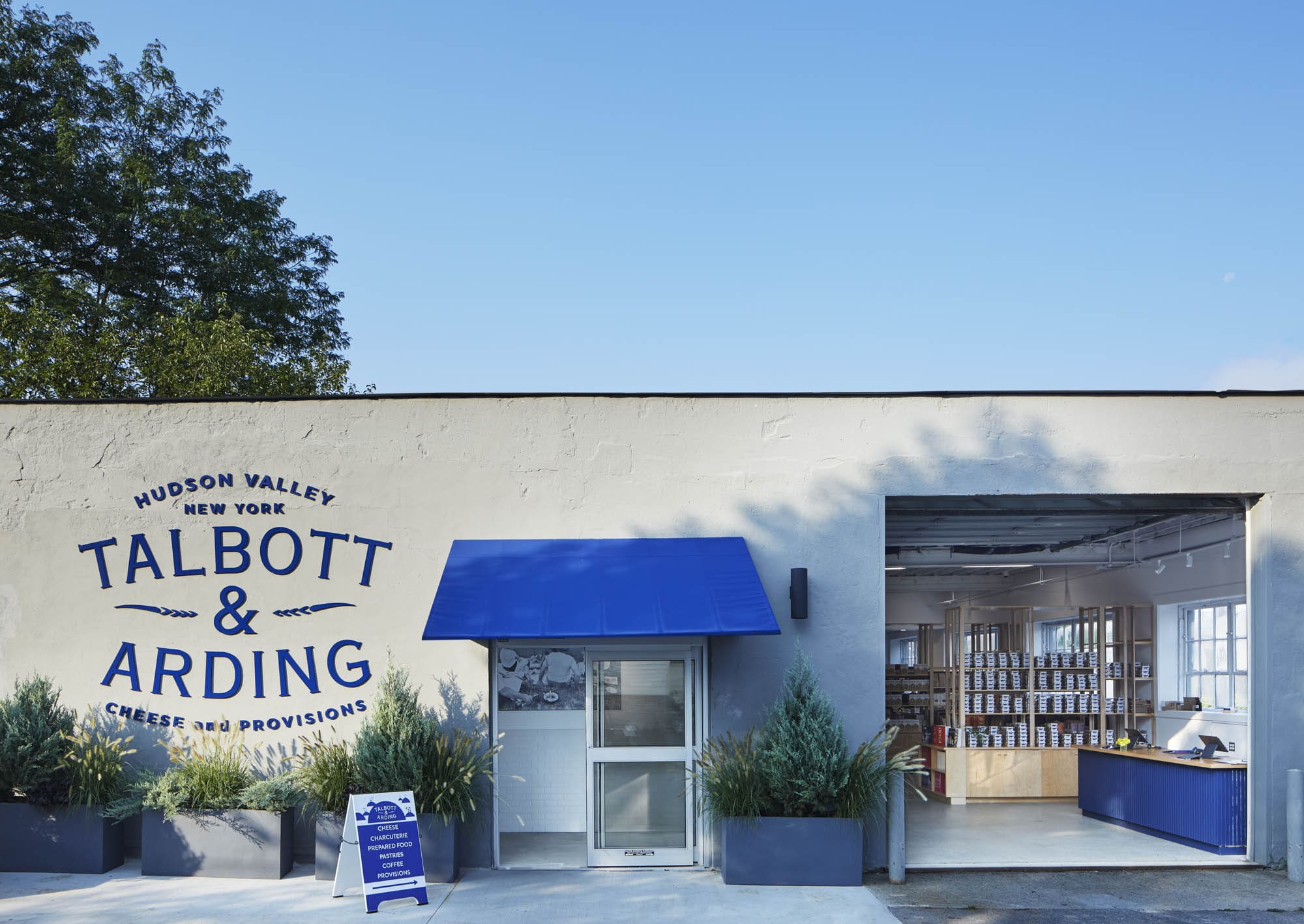 The best restaurants and shops in Hudson NY | The blue and white exterior of Talbott & Arding