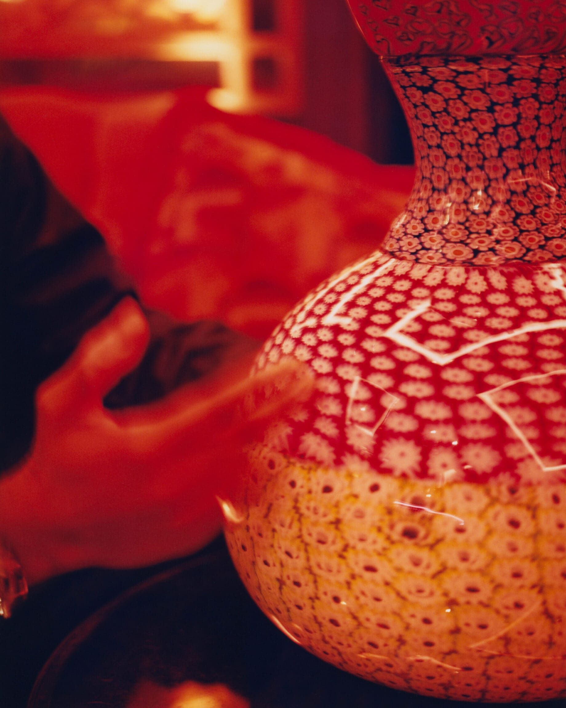 Yinka Ilori interview | Yinka Ilori's original murano glass sculpture in the red-lit interiors of Mayfair private member's club George.