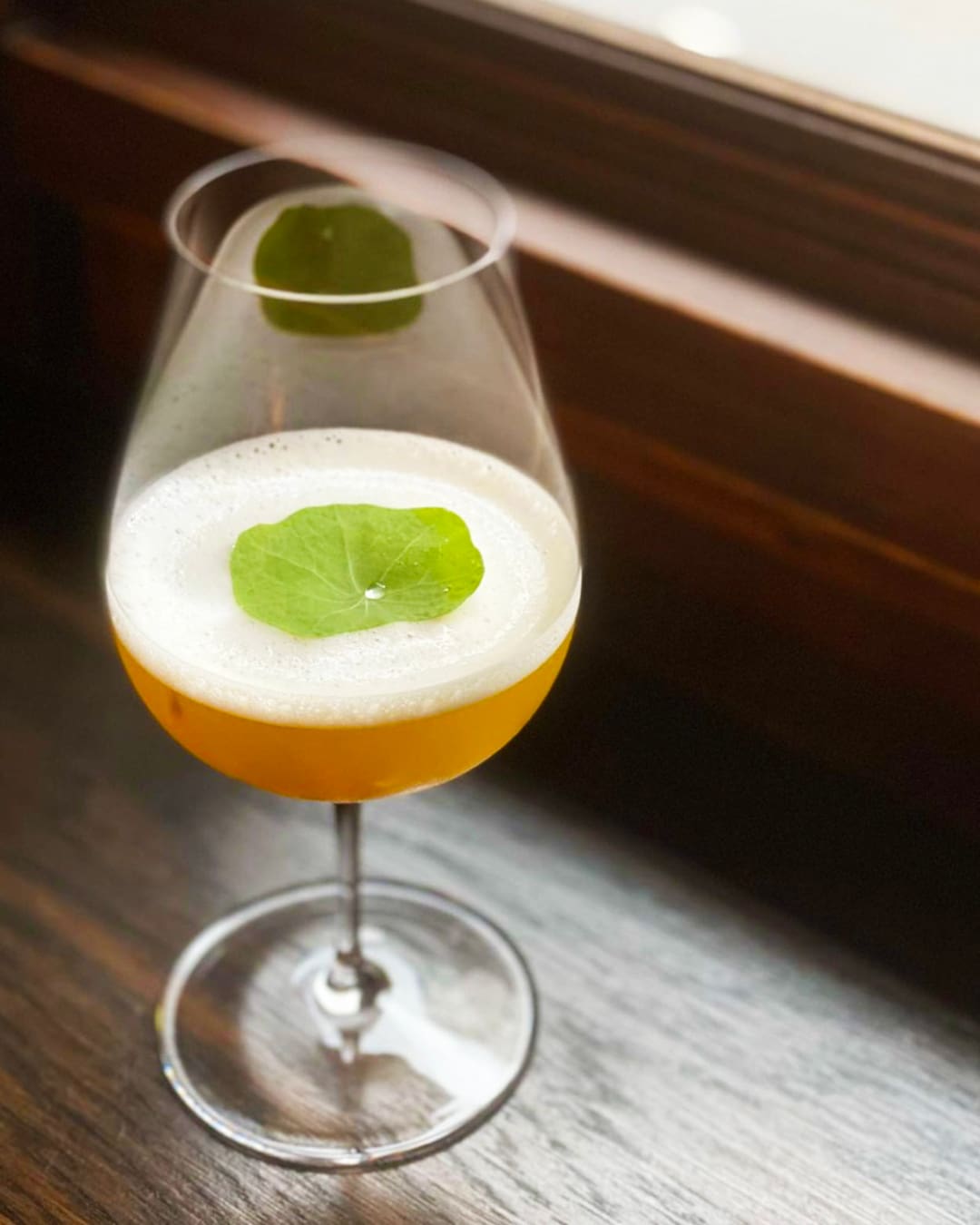 The best cocktail bars in Tokyo | Gin, lemongrass, plum kernel, tomato and passion fruit cocktail served at The Bellwood.