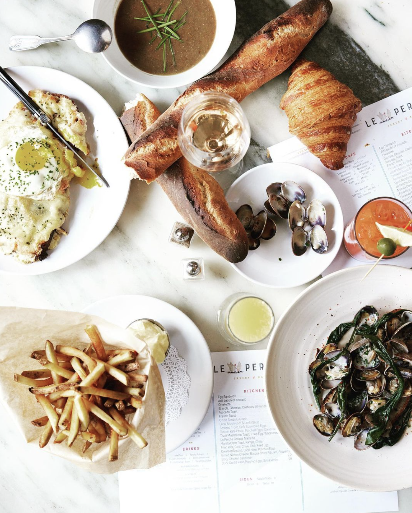 The best restaurants in Hudson NY | an aerial view of pastries, mussels and chips at Le Perche Bakery and Bar
