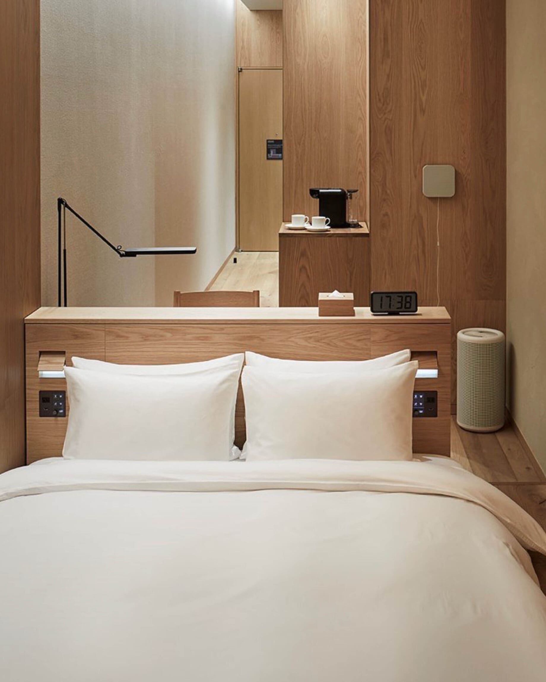 The best hotels in Tokyo | A minimalist bedroom at Muji Hotel