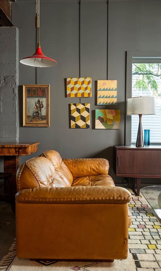 The best shops in Hudson NY | a brown leather sofa and curated art at Finch