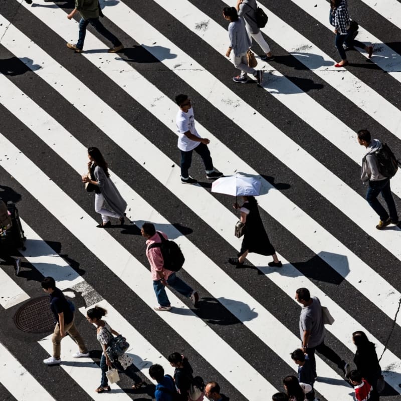 My City: Tokyo | Pedestrians walking across Shibuya Crossing in Tokyo.