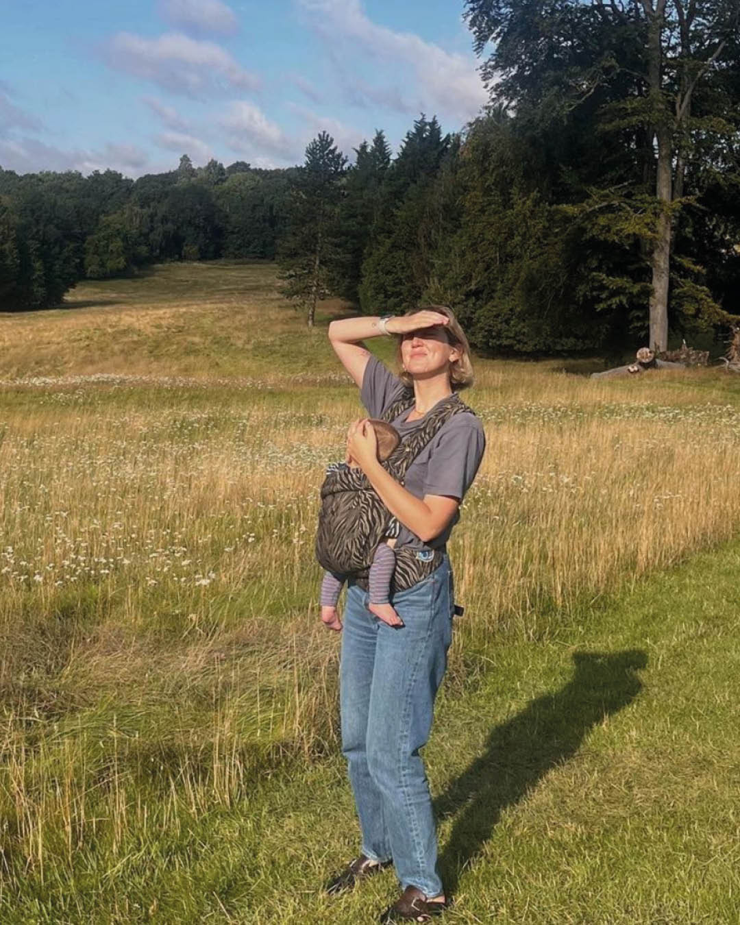 Alice Tate wearing an Artipoppe baby carrier at Birch, Selsdon