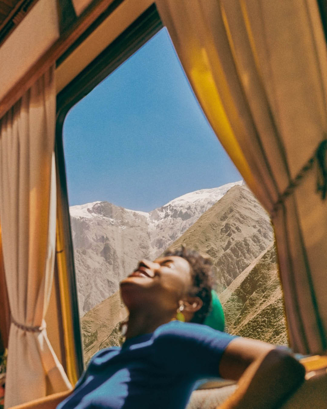 A woman onboard the Belmond Hiram Bingham train in Machu Picchu