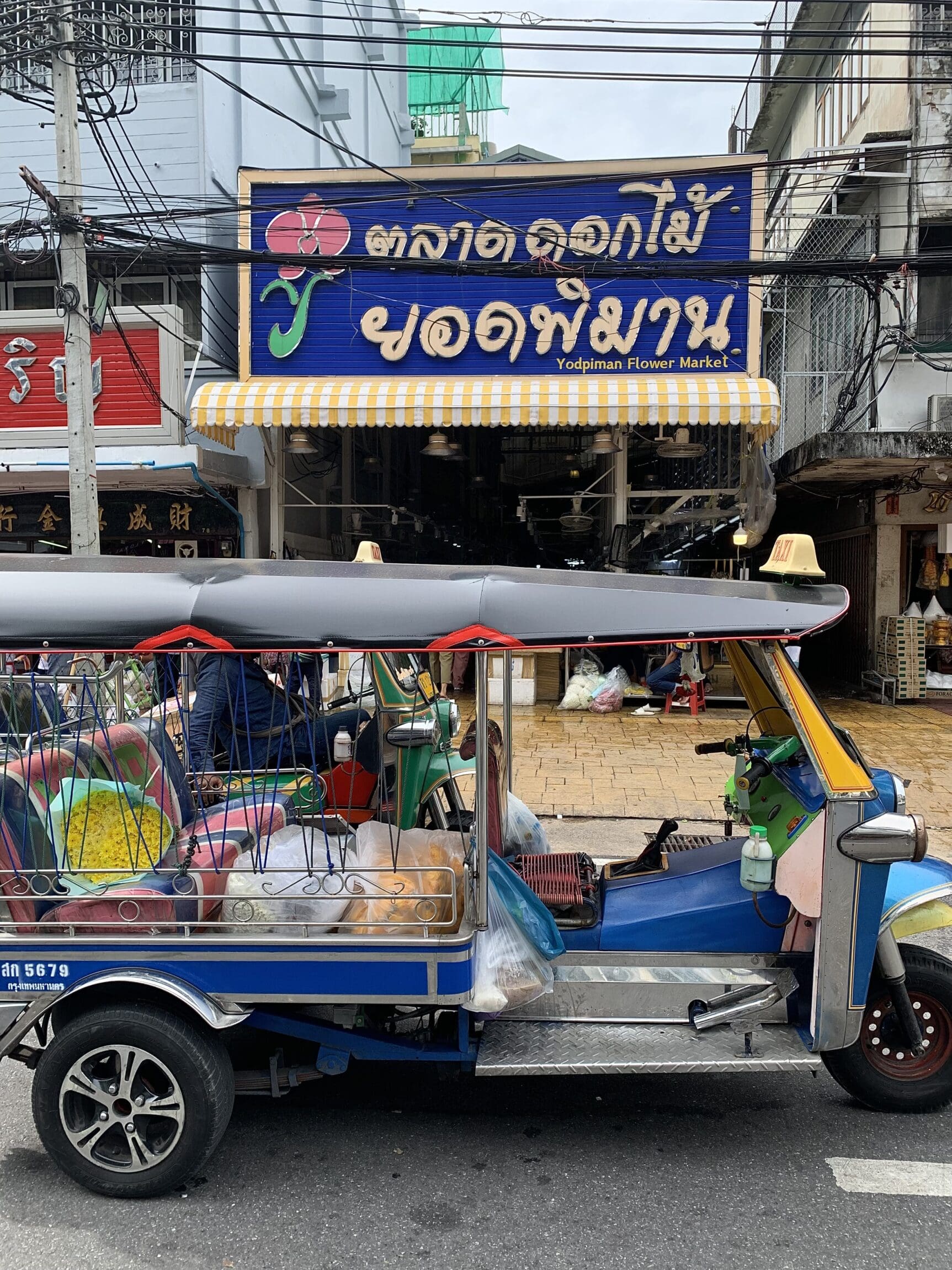 The best markets in Bangkok | A tuk tuk at Pak Klong Talad, also known as Bangkok Flower Market