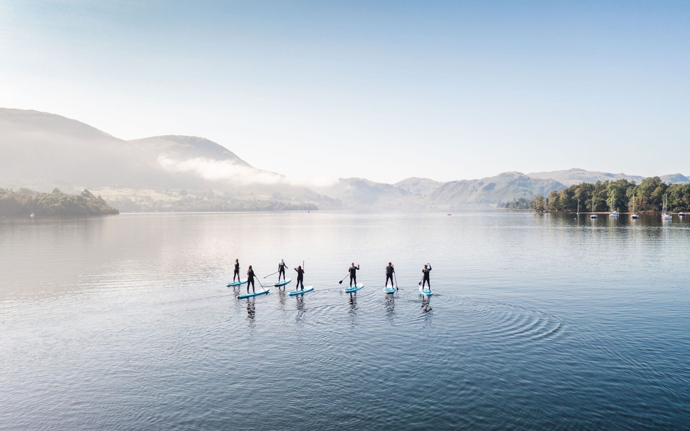 2024 Wellness travel trends | Paddle boarding in the Lake District, courtesy of Another Place