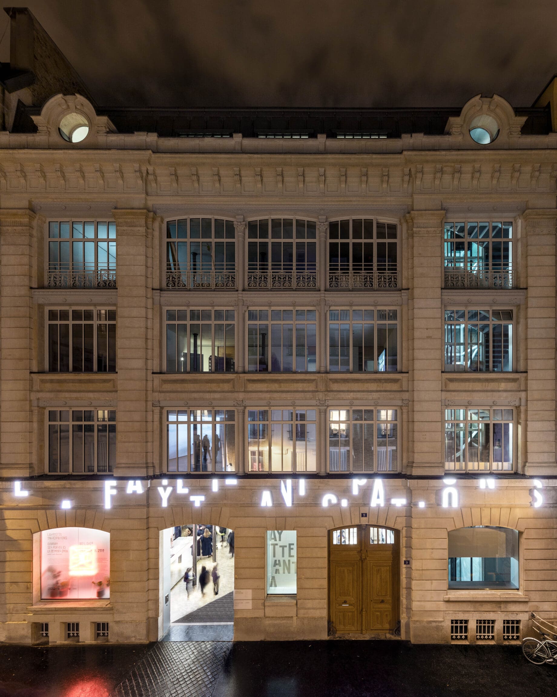 The best art galleries and museums in Paris | The facade of Lafayette Anticipations at night.