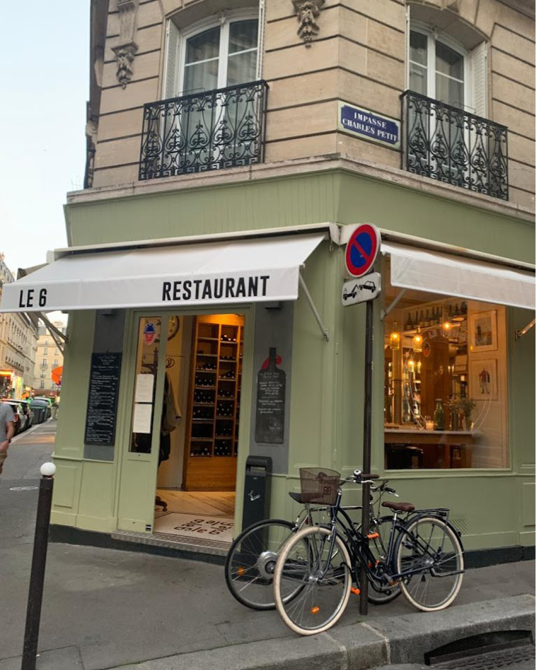 The best restaurants in Paris | The sage green facade of Le 6 Paul Bert