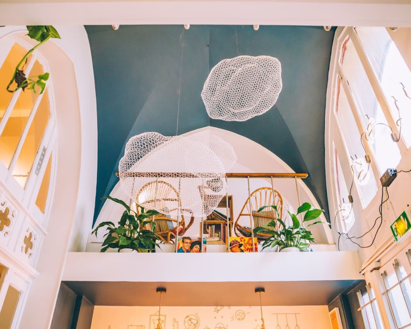 The best co-working spaces in Paris | The arched double height ceiling inside Nuage Cafe.