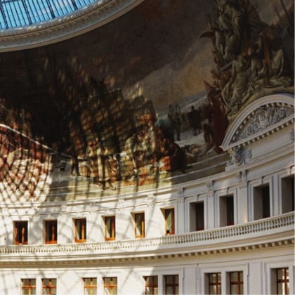 The curved walls and painted ceiling of the Bourse de Commerce museum