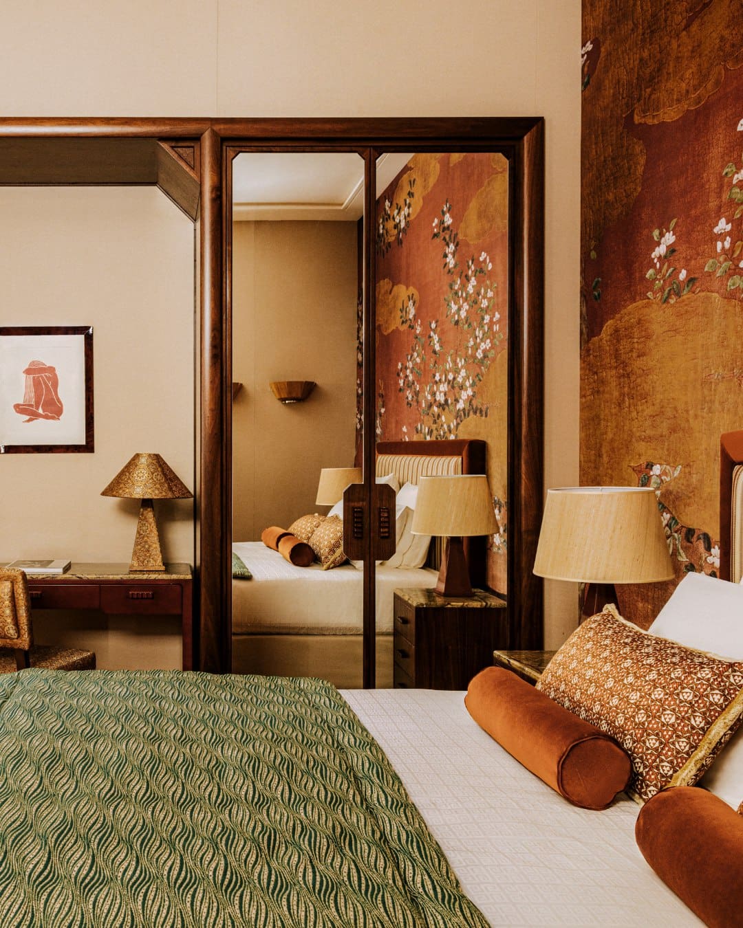 A suite with patterned wallpaper at Saint James Paris