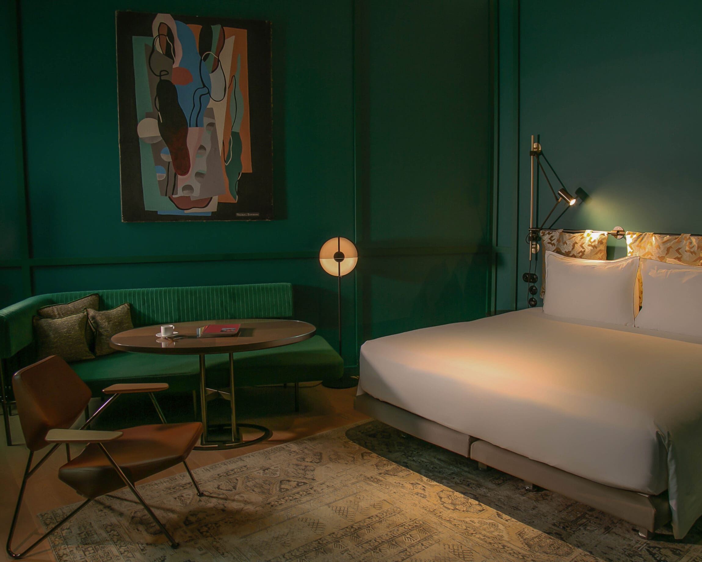 The best boutique hotels in Paris | A green bedroom at Le Ballu