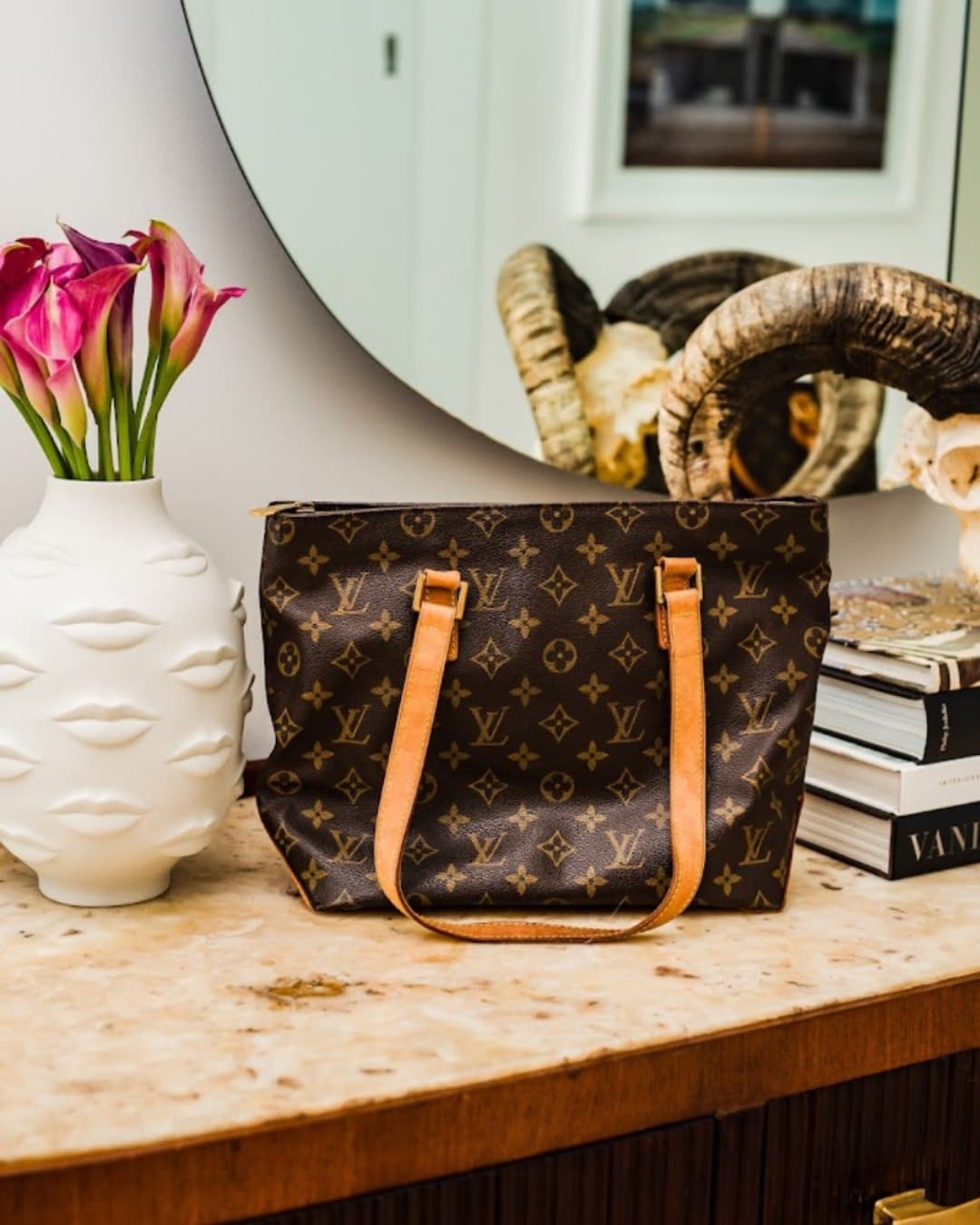 The best vintage stores in New York | a Louis Vuitton handbag on a table
