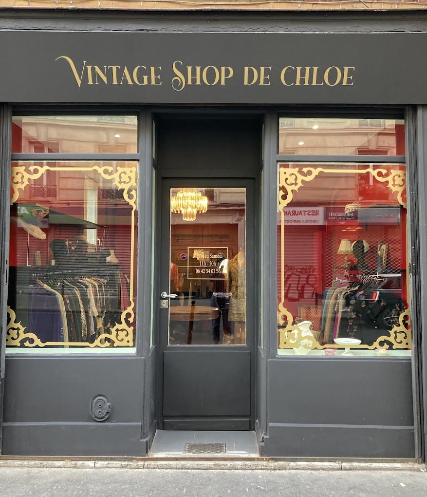 The best vintage shops in Paris | The black and golden laced exterior of Vintage Shop de Chloé