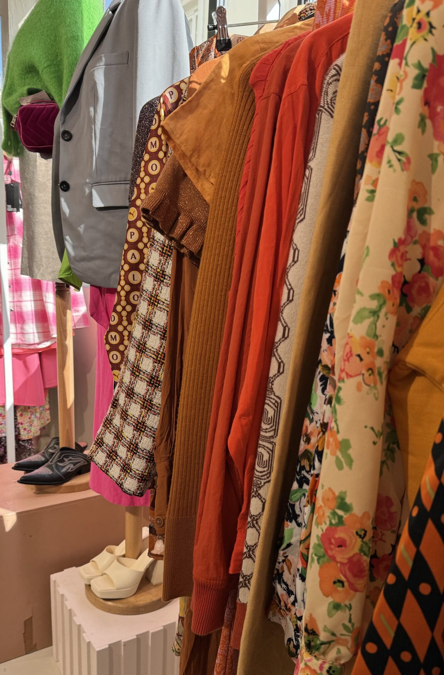 The best vintage shops in Paris | The colourful clothing rails of La Frange à l’Enverse